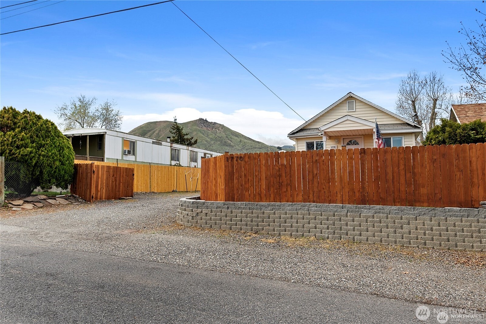 1770 Marker Avenue Wenatchee, WA 98801 - Photo 31 of 32 a front view of a house with a yard