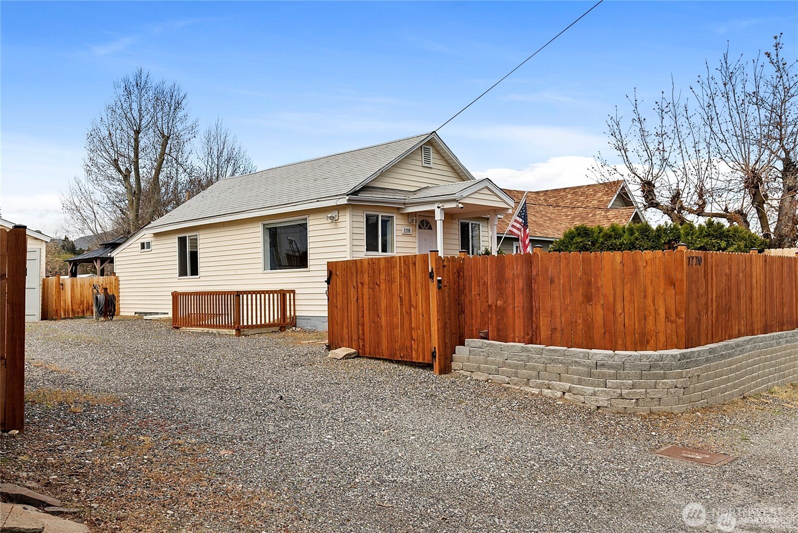 1770 Marker Avenue Wenatchee, WA 98801 - Photo 32 of 32 a front view of a house with a yard and garage