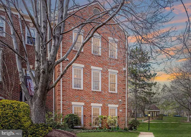 a brick building with large windows