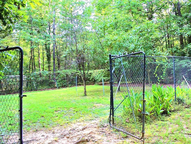 136 Kingson Road Fortson, GA 31808 - Photo 24 of 28 FENCED-IN GARDEN AREA