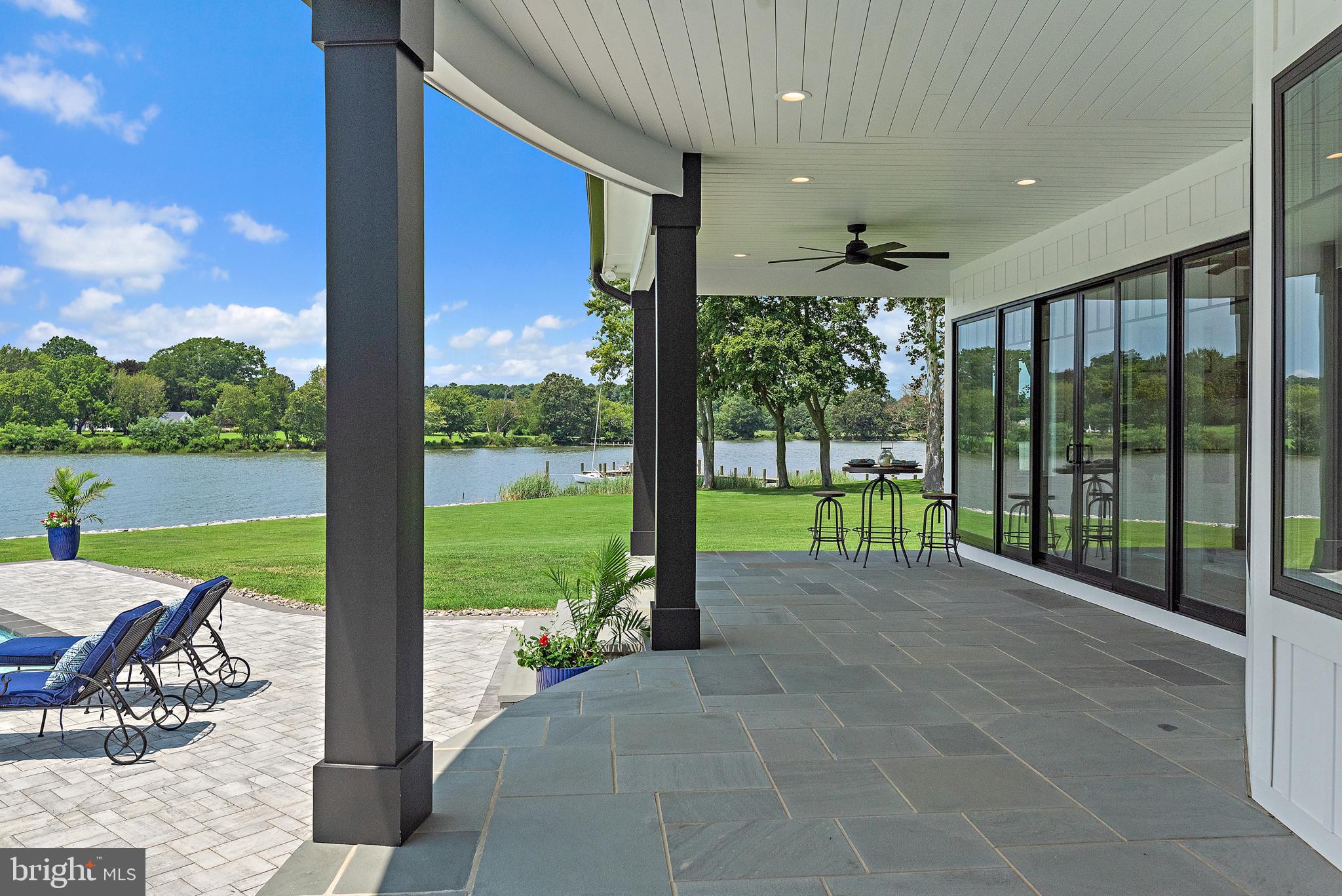 2452 Bennett Point Road Queenstown, MD 21658 - Photo 95 of 108 Sliders to slate patio