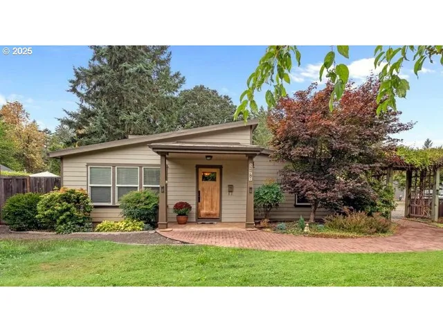 a black and white photo of a house