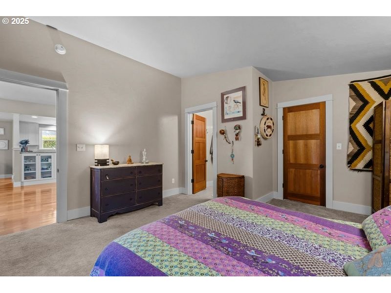24781 Dunham Road Veneta, OR 97487 - Photo 12 of 22 a bedroom with a bed and a dresser