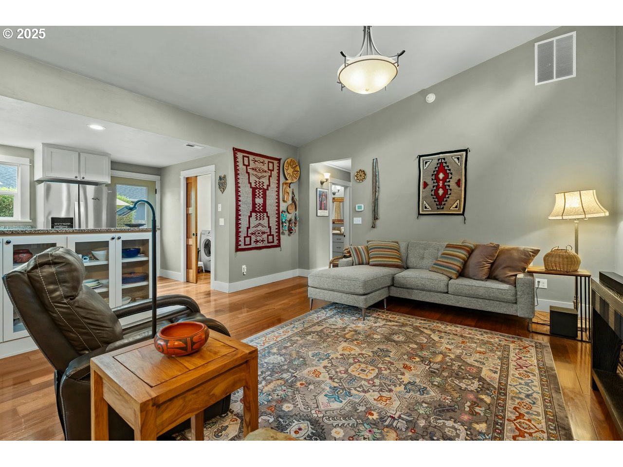 24781 Dunham Road Veneta, OR 97487 - Photo 6 of 22 a living room with furniture and a flat screen tv