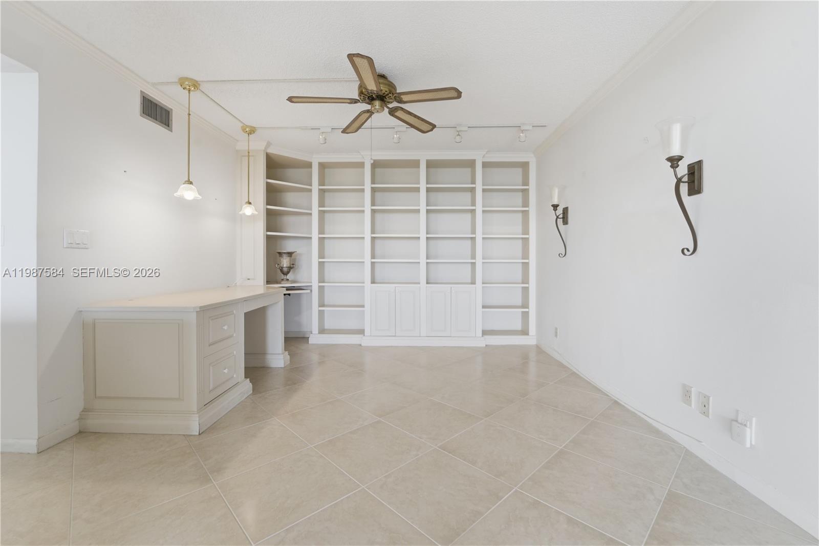 19670 South Beach Road, Unit B323 Tequesta, FL 33469 - Photo 18 of 57 a view of a livingroom with a cabinets