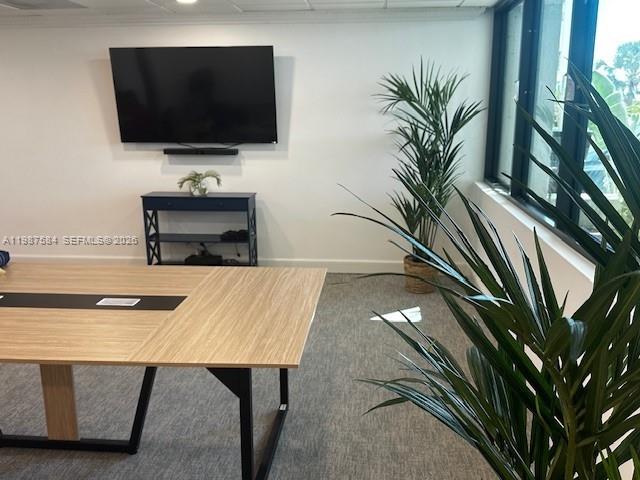 19670 South Beach Road, Unit B323 Tequesta, FL 33469 - Photo 19 of 31 a living room with furniture and a flat screen tv