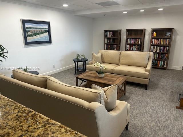 19670 South Beach Road, Unit B323 Tequesta, FL 33469 - Photo 20 of 31 a living room with furniture and cabinet