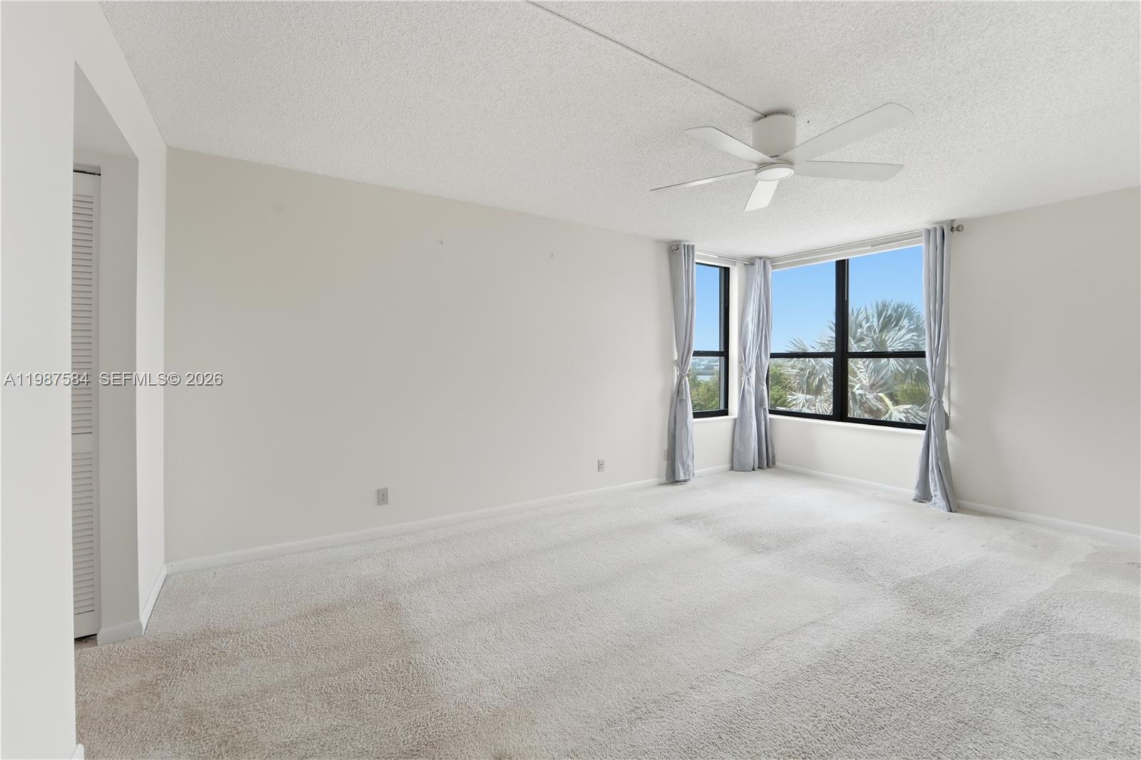 19670 South Beach Road, Unit B323 Tequesta, FL 33469 - Photo 22 of 57 a view of an empty room with a window