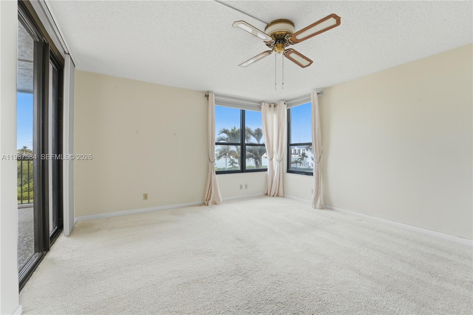 19670 South Beach Road, Unit B323 Tequesta, FL 33469 - Photo 31 of 57 a view of an empty room with a window
