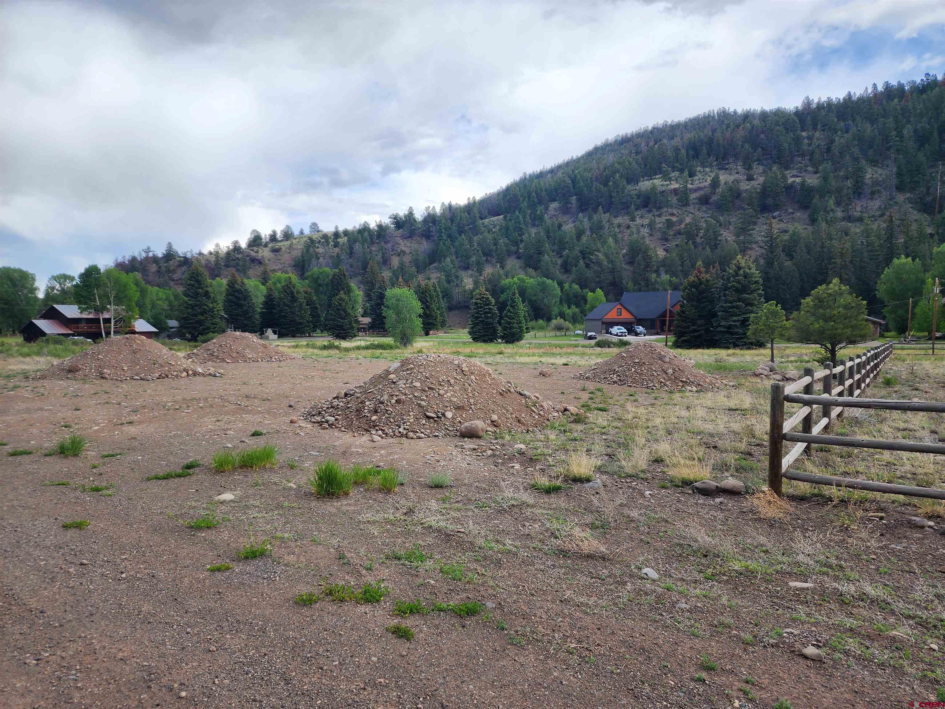 56 East Frontage Road South Fork, CO 81154 - Photo 2 of 7 a view of a dirt road with mountain view