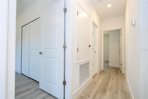 a bathroom with a toilet a sink and shower