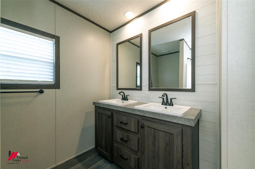 810 Chalybeate Springs Road Plain Dealing, LA 71064 - Photo 17 of 38 Second Full Bathroom with Double Vanity