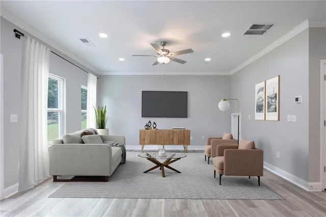 a living room with furniture and a lamp