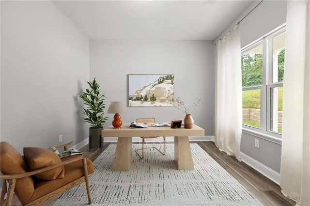 a workspace with furniture and window