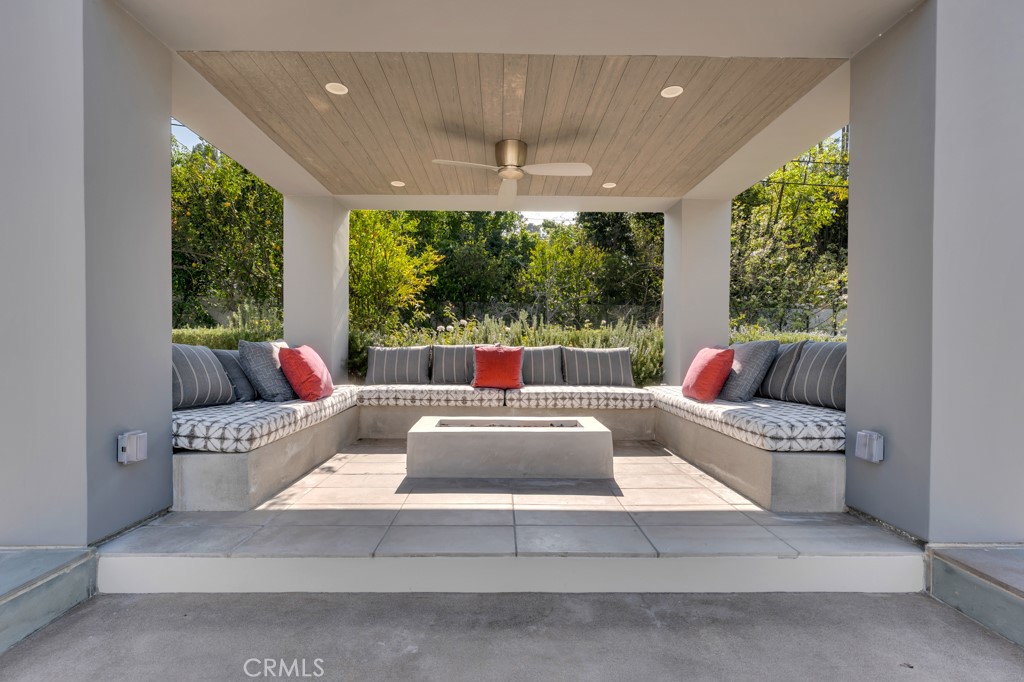 17950 Rancho Street Encino, CA 91316 - Photo 64 of 75 a living room with furniture and a large window