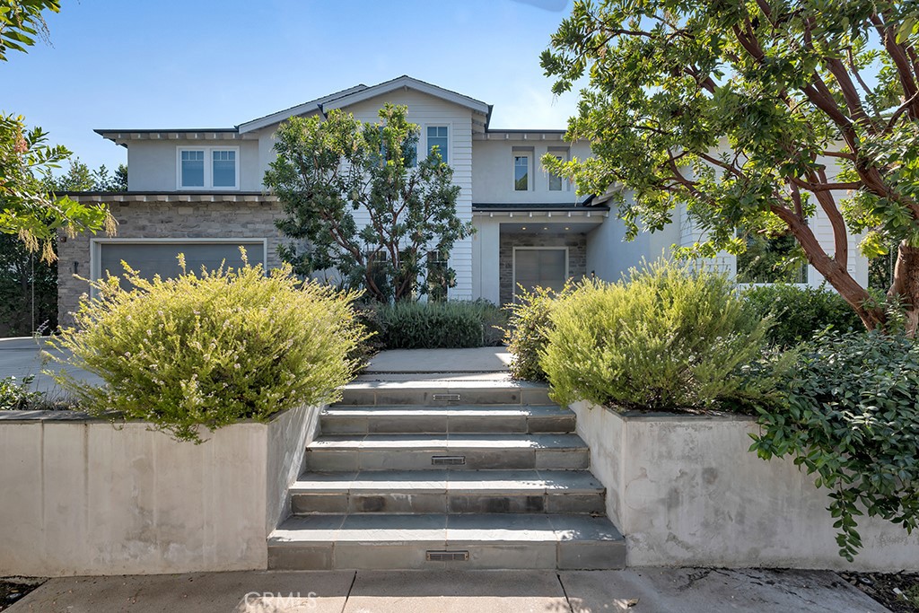 17950 Rancho Street Encino, CA 91316 - Photo 73 of 75 a view of a potted plants in front of a house