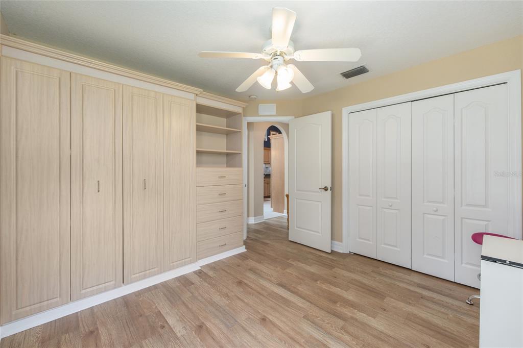 18825 Southwest 93rd Loop Dunnellon, FL 34432 - Photo 35 of 85 a view of an empty room with wooden floor