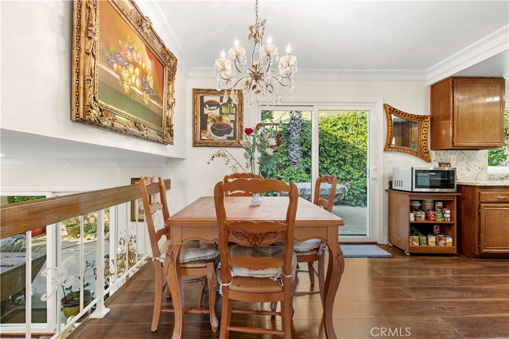 7125 Lonzo Street Tujunga, CA 91042 - Photo 11 of 66 a view of a dining room with furniture window and outside view