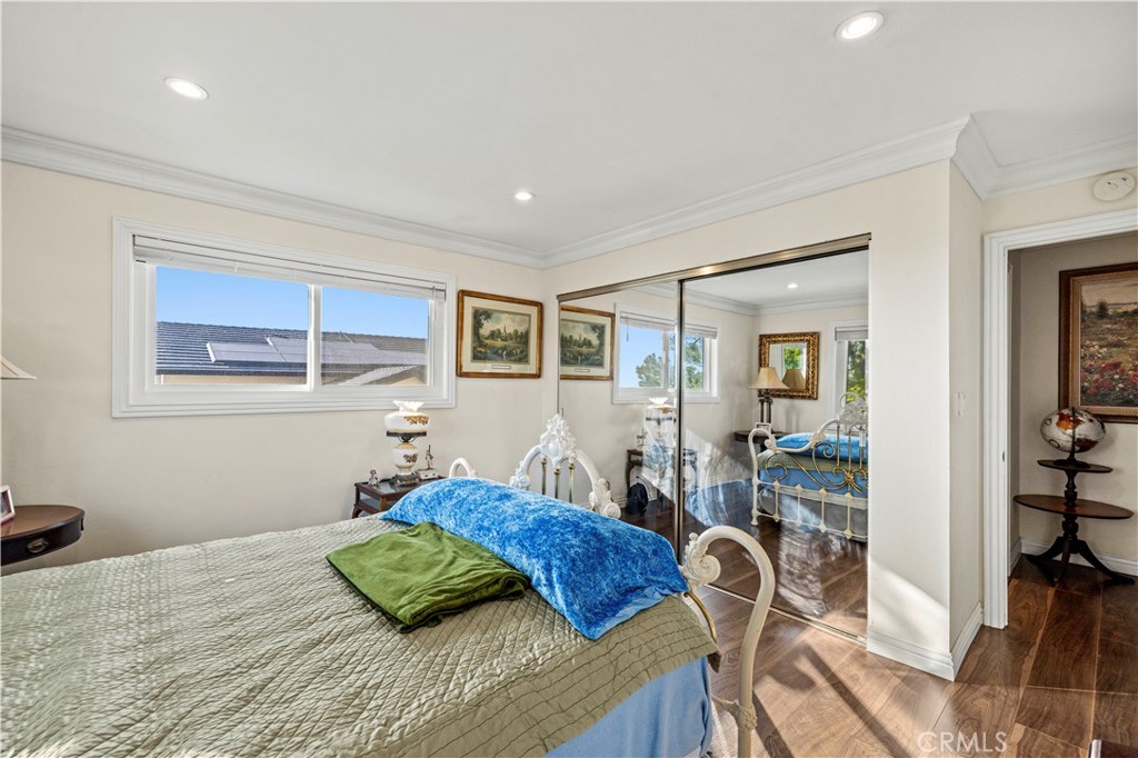 7125 Lonzo Street Tujunga, CA 91042 - Photo 29 of 66 a bedroom with a bed and a table in it