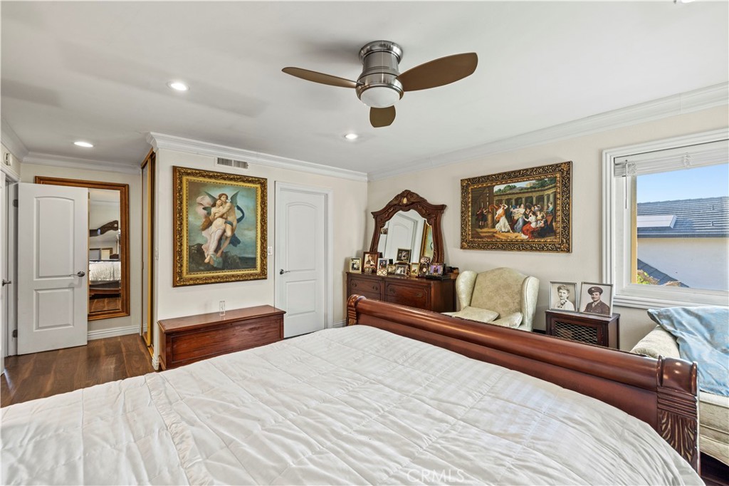 7125 Lonzo Street Tujunga, CA 91042 - Photo 36 of 66 a bedroom with a bed and a dresser