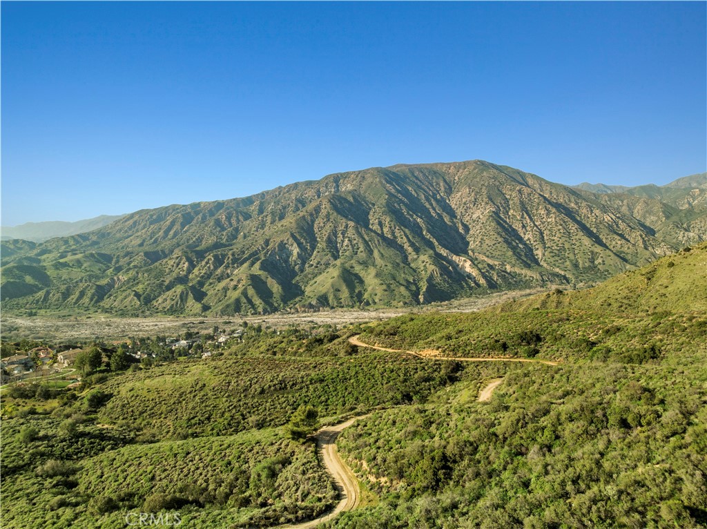 7125 Lonzo Street Tujunga, CA 91042 - Photo 61 of 66 a view of a large mountain with mountains in the background