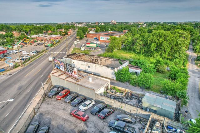 a view of a balcony with an outdoor seating