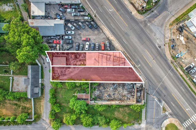 an aerial view of house with yard