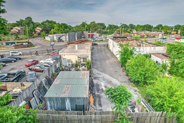 a view of a lake with sitting area