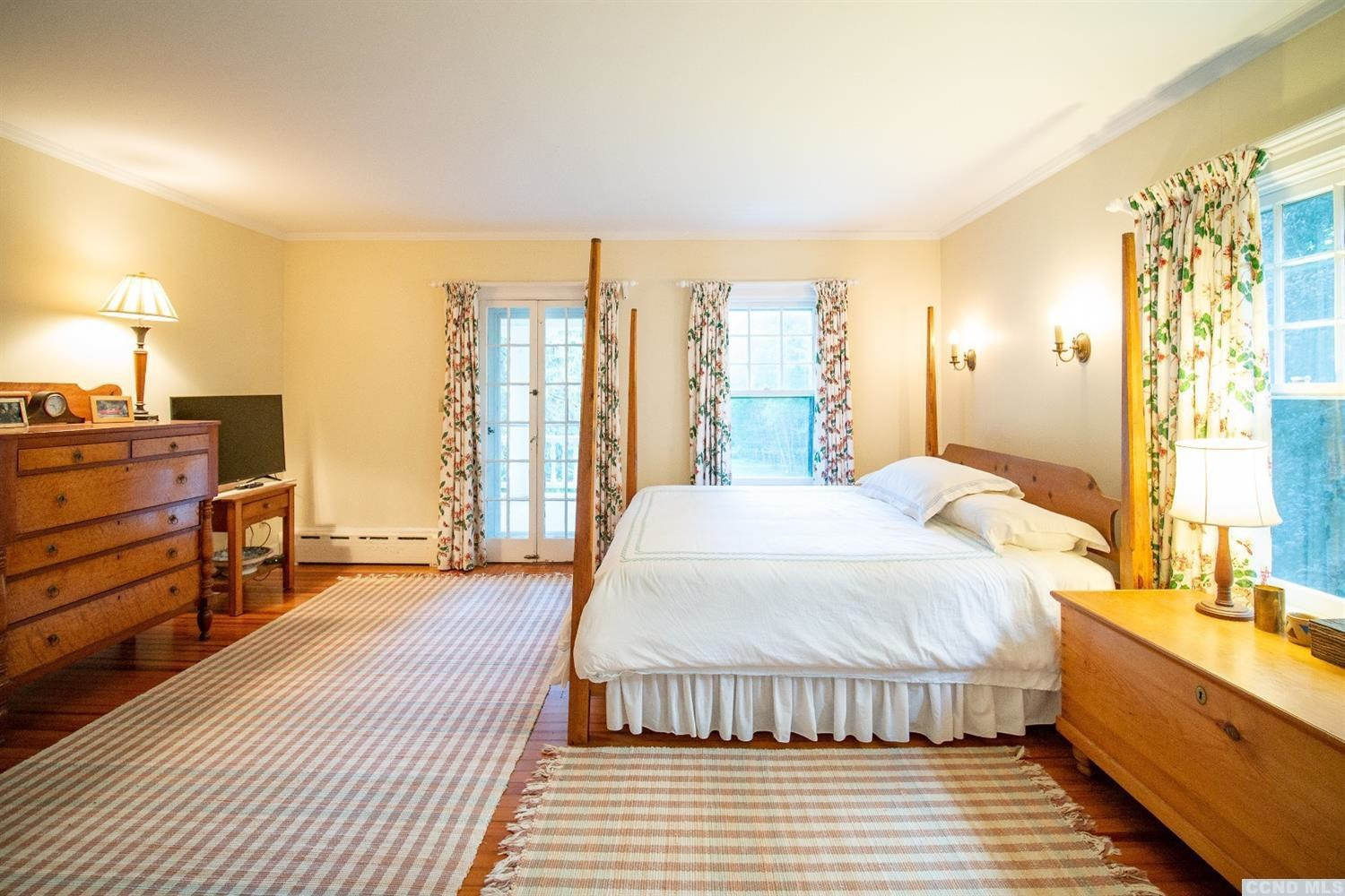 53 Methodist Hill Road Rensselaerville, NY 12147 - Photo 14 of 35 a spacious bedroom with a bed and wooden floor