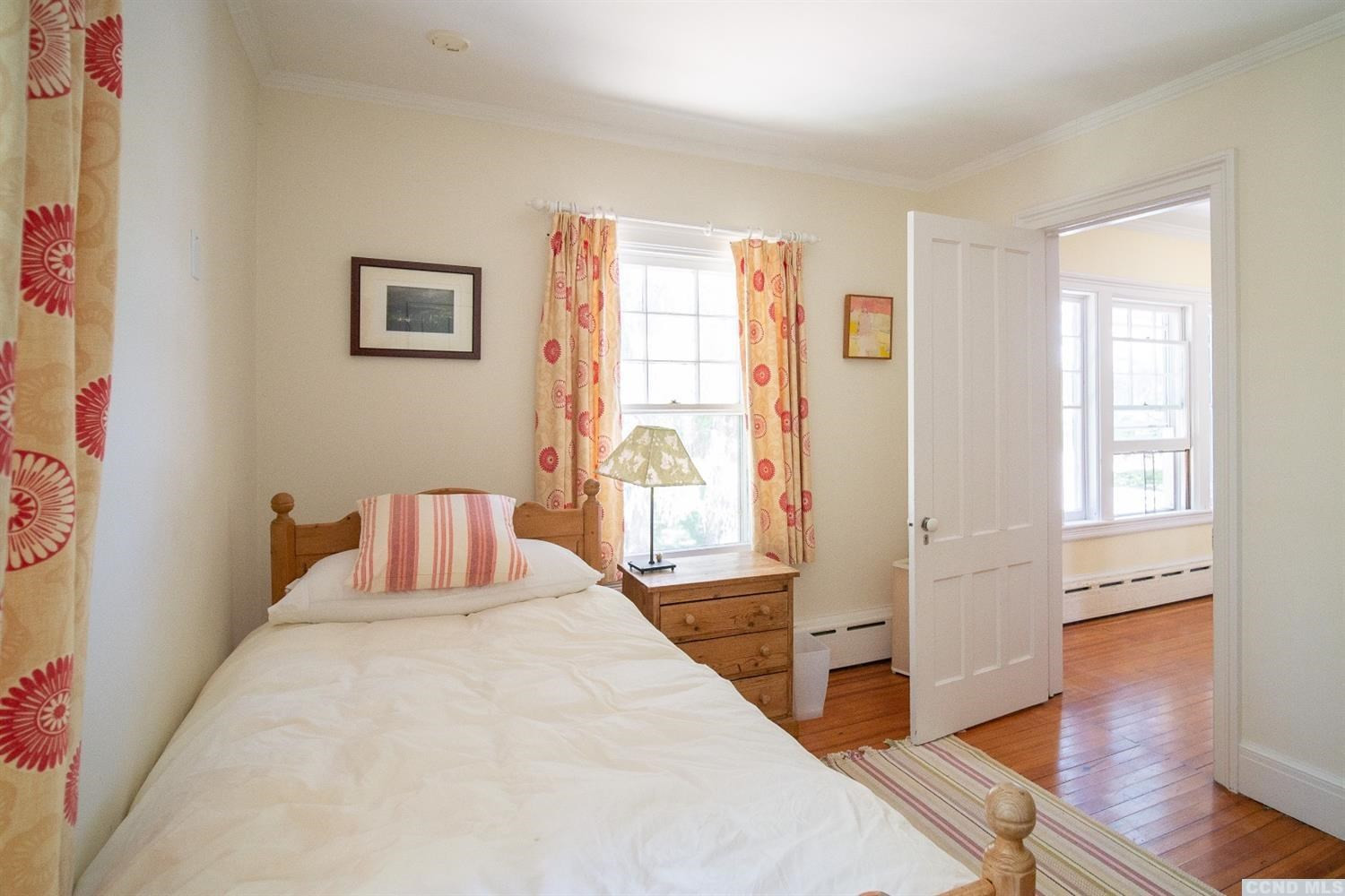 53 Methodist Hill Road Rensselaerville, NY 12147 - Photo 17 of 35 a bedroom with a bed and wooden floor