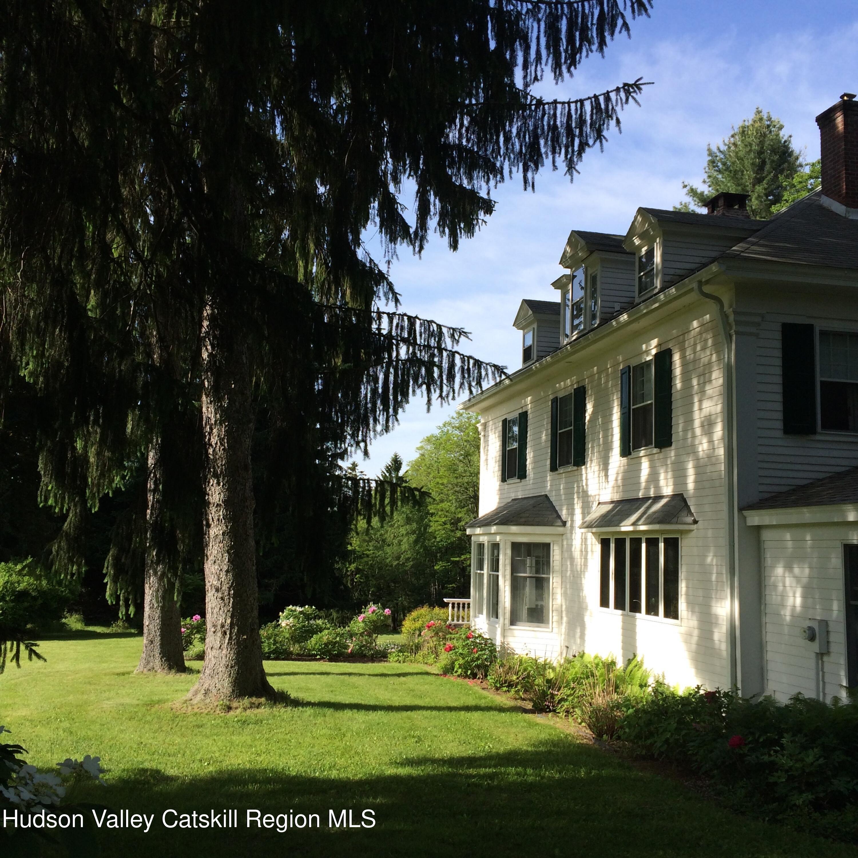 53 Methodist Hill Road Rensselaerville, NY 12147 - Photo 2 of 35 a front view of a house with a garden