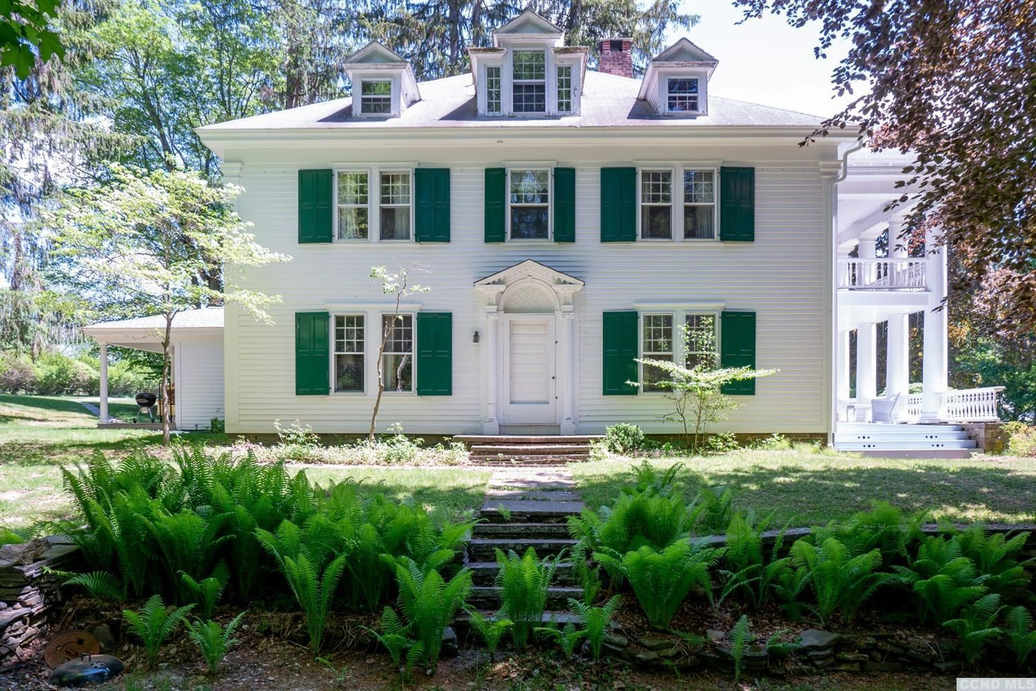 53 Methodist Hill Road Rensselaerville, NY 12147 - Photo 24 of 35 a front view of a house with a garden