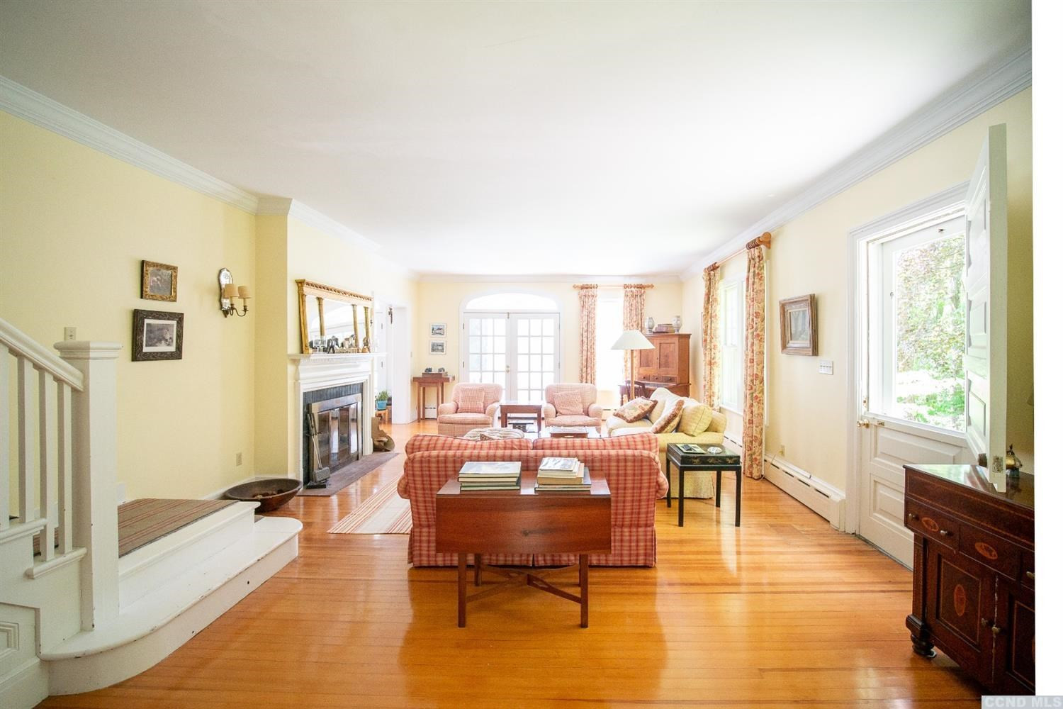 53 Methodist Hill Road Rensselaerville, NY 12147 - Photo 7 of 35 a living room with fireplace furniture and a large window