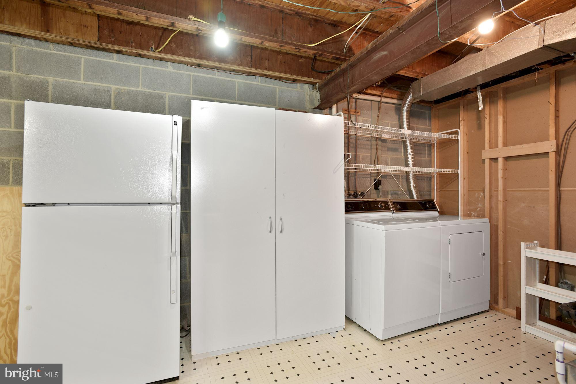2263 Double Eagle Court Reston, VA 20191 - Photo 29 of 33 Laundry room with extra fridge.