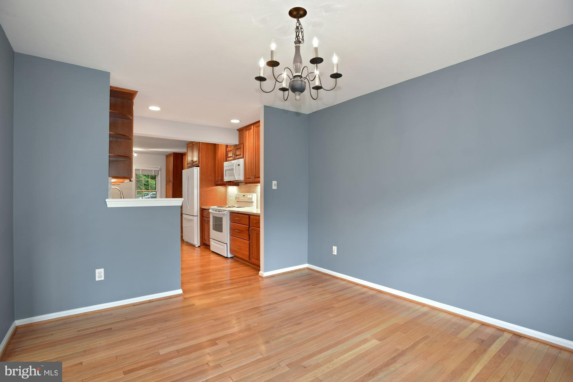 2263 Double Eagle Court Reston, VA 20191 - Photo 9 of 33 Dining room leading to kitchen