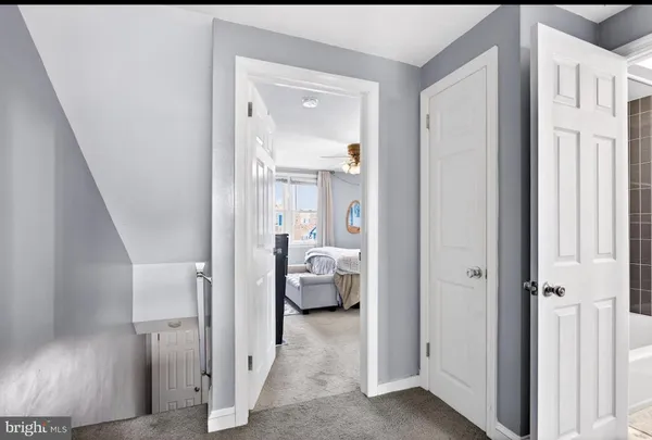 a view of a bedroom from hallway