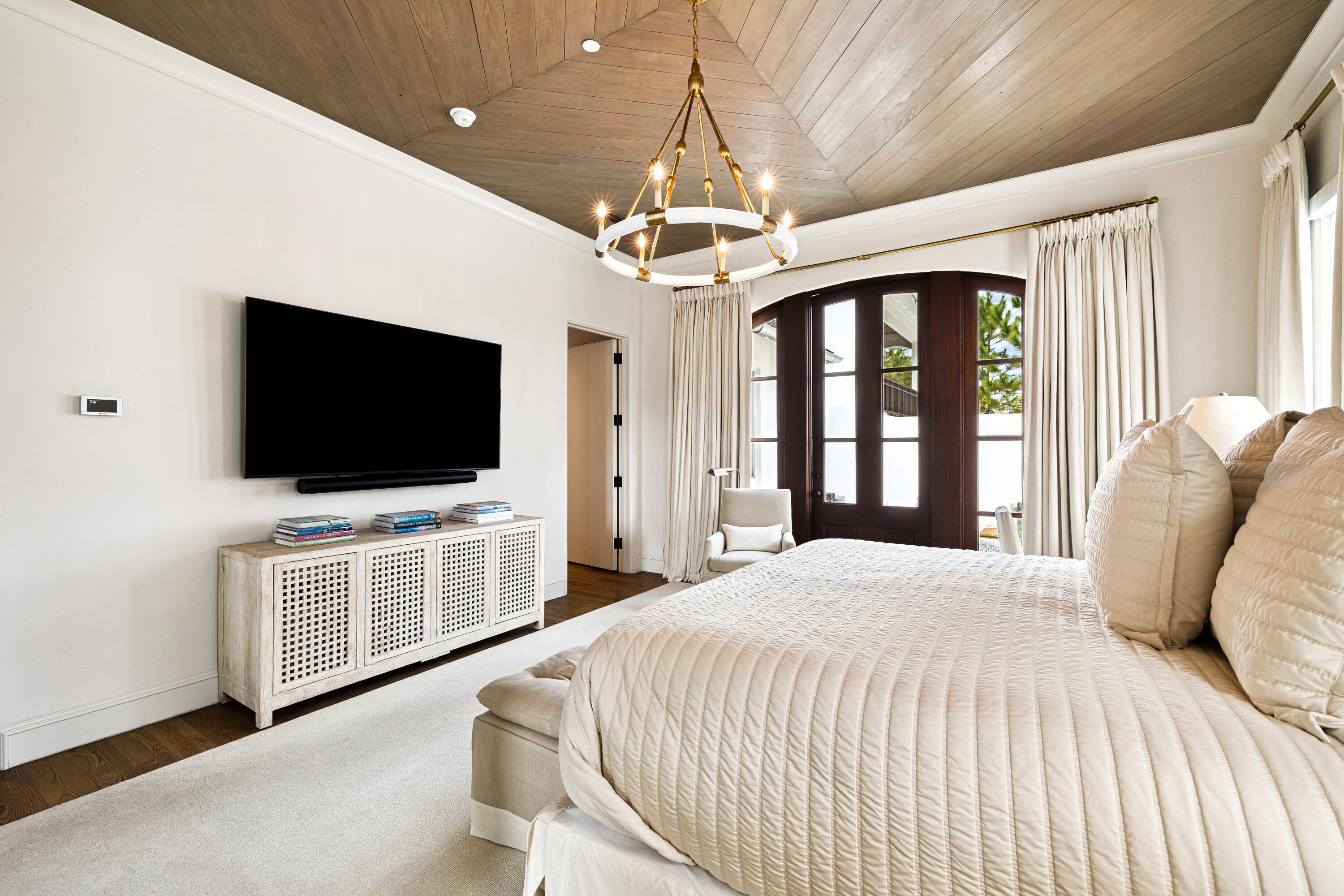 78 West Kingston Road Inlet Beach, FL 32461 - Photo 35 of 75 a spacious bedroom with a bed and a flat screen tv