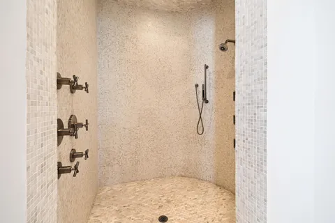 a view of a swimming pool with outdoor seating area