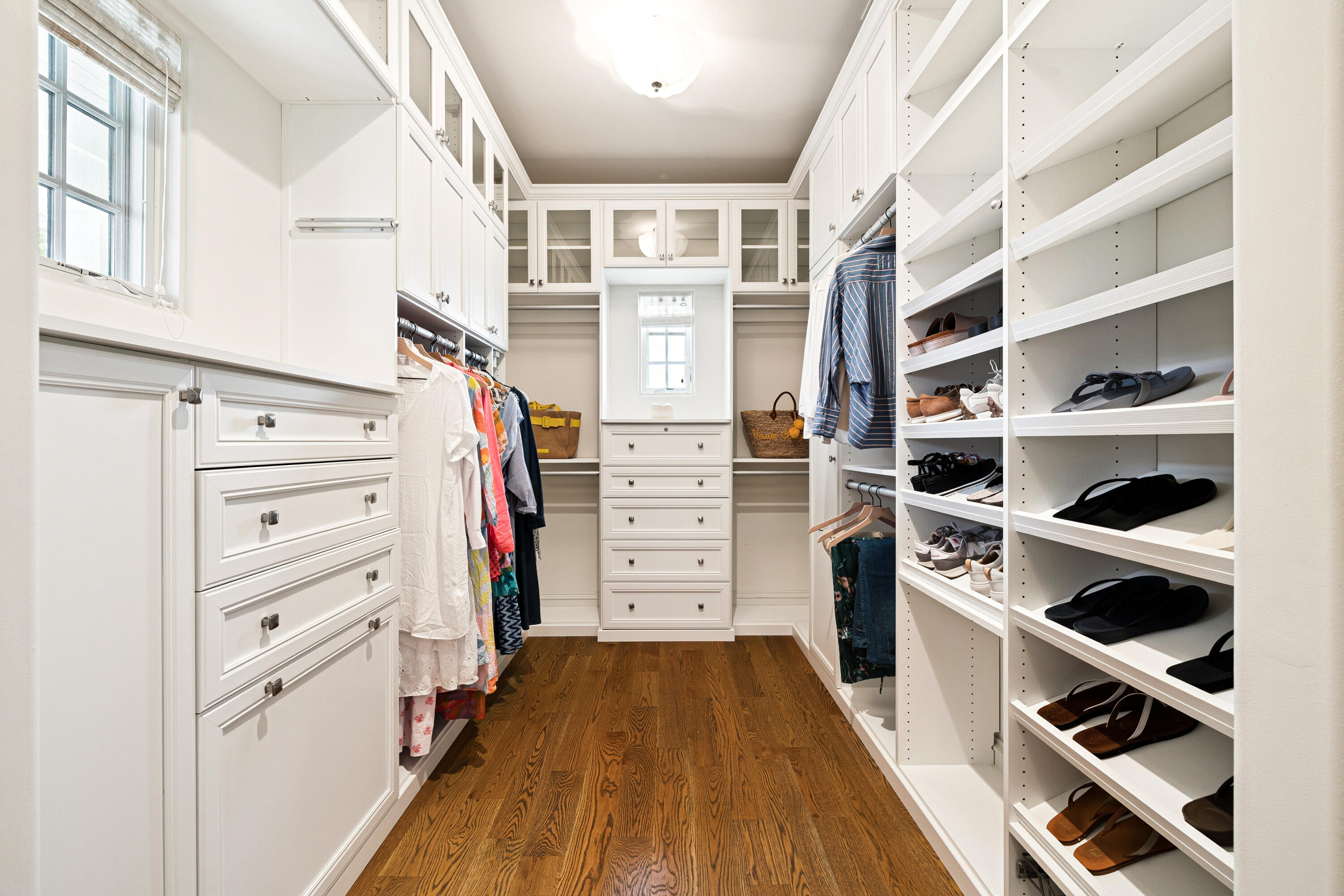 78 West Kingston Road Inlet Beach, FL 32461 - Photo 40 of 75 a view of walk in closet with clothes and shoes