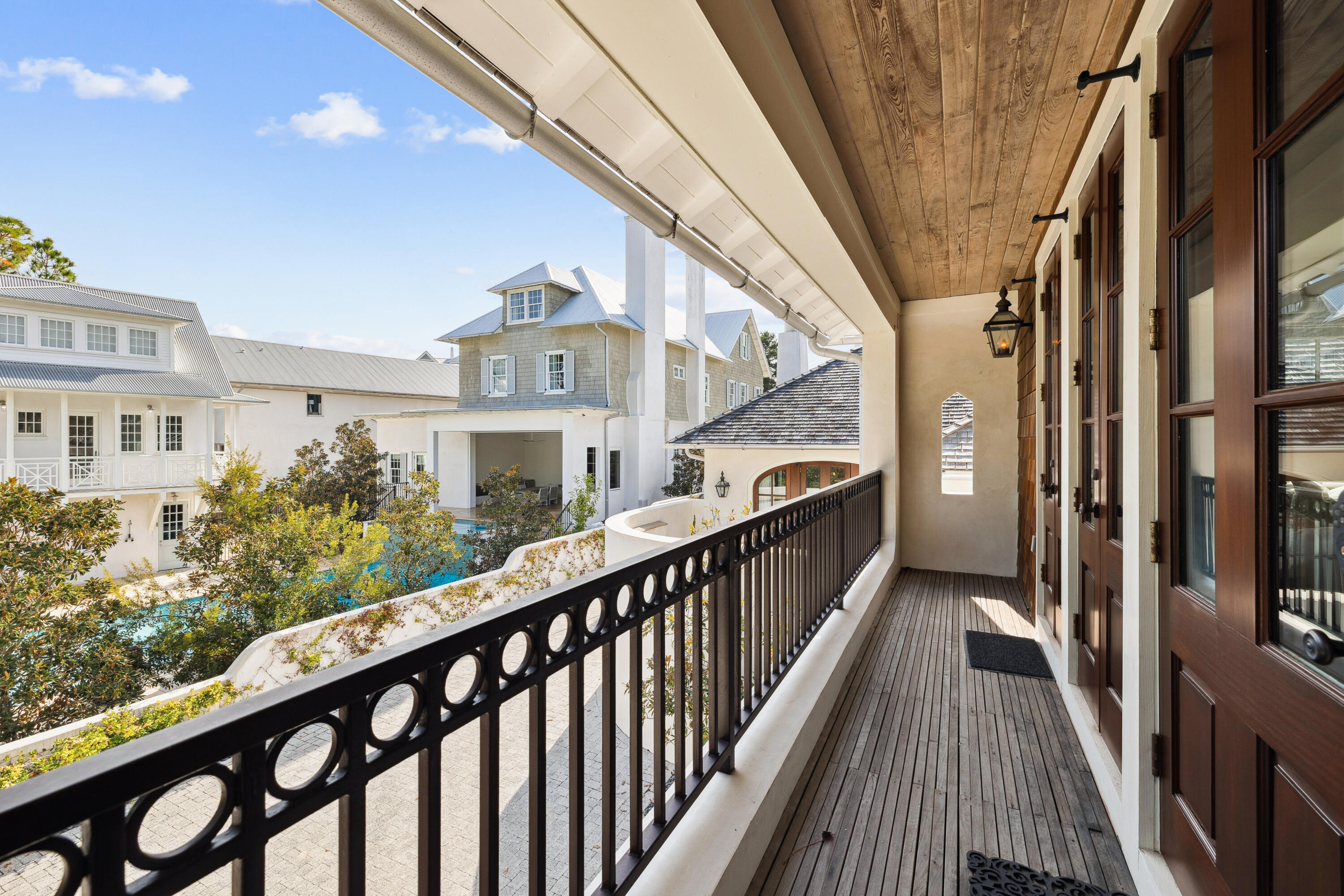 78 West Kingston Road Inlet Beach, FL 32461 - Photo 63 of 75 a view of a balcony with wooden floor and fence