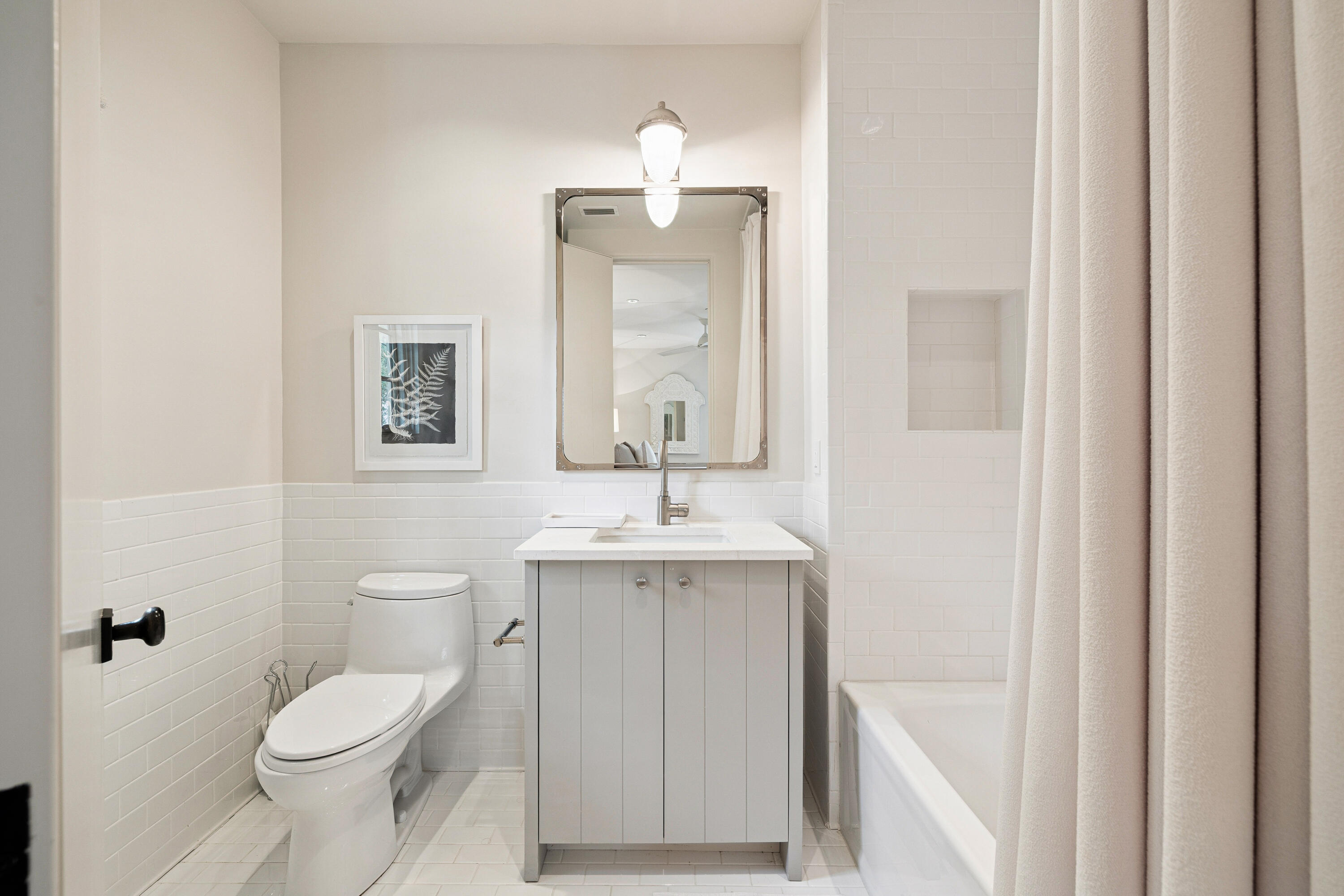 78 West Kingston Road Inlet Beach, FL 32461 - Photo 68 of 75 a bathroom with a toilet sink and mirror