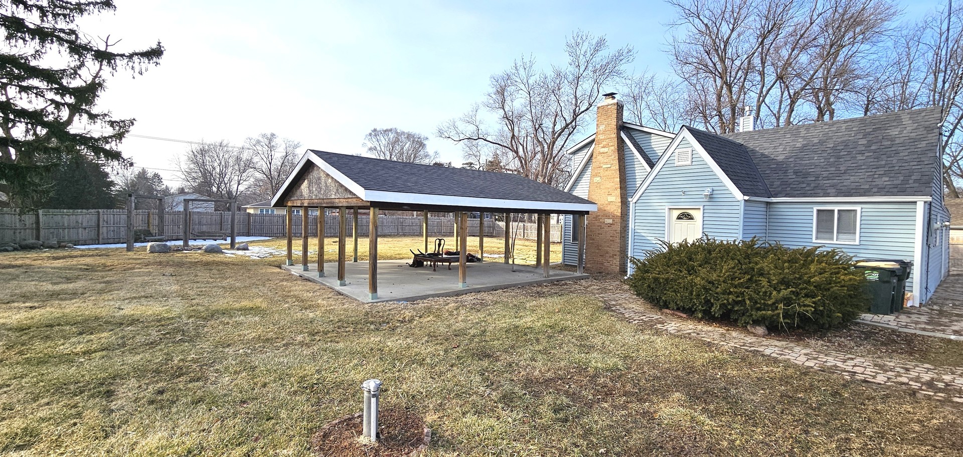 36107 North Green Bay Road Waukegan, IL 60087 - Photo 16 of 17 a view of a house with backyard and a garden