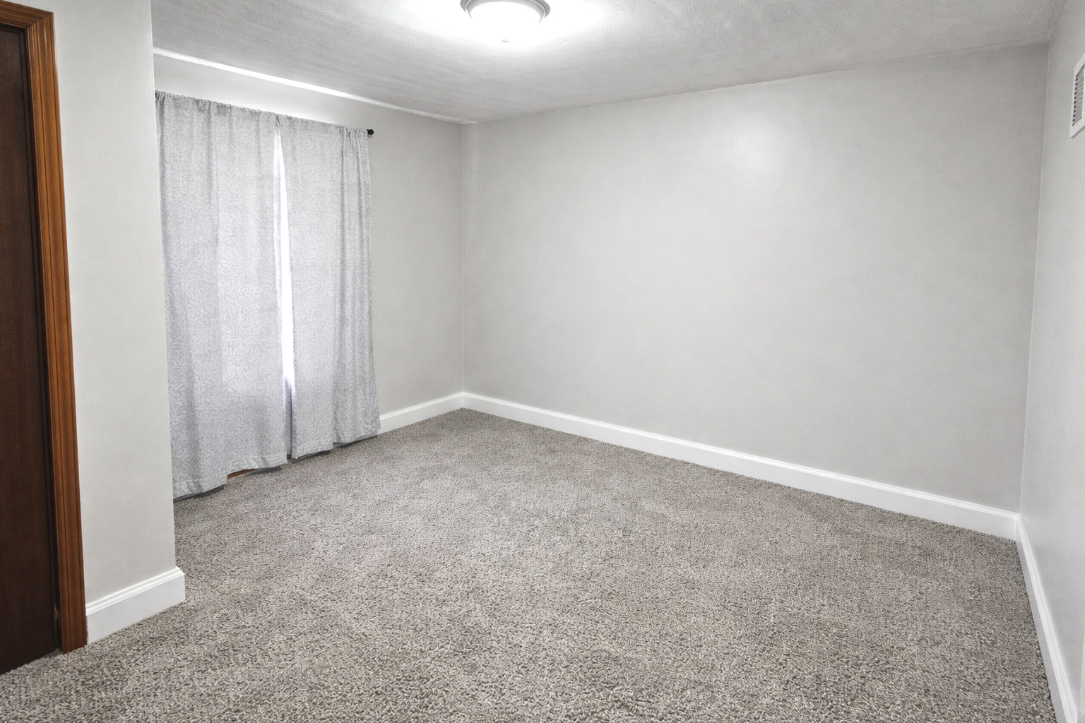 36107 North Green Bay Road Waukegan, IL 60087 - Photo 10 of 17 an empty room with a empty space and a window