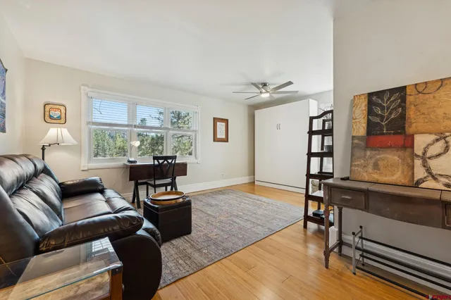 a kitchen with a sink cabinets and window