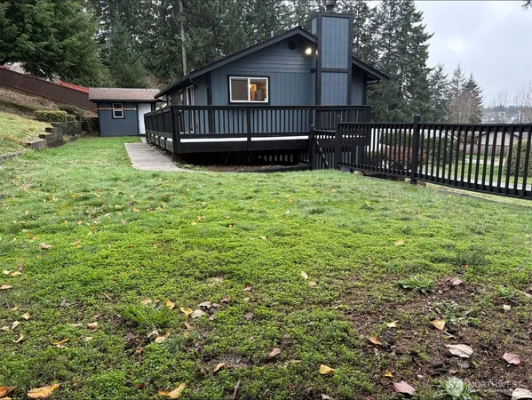 a view of backyard with green space