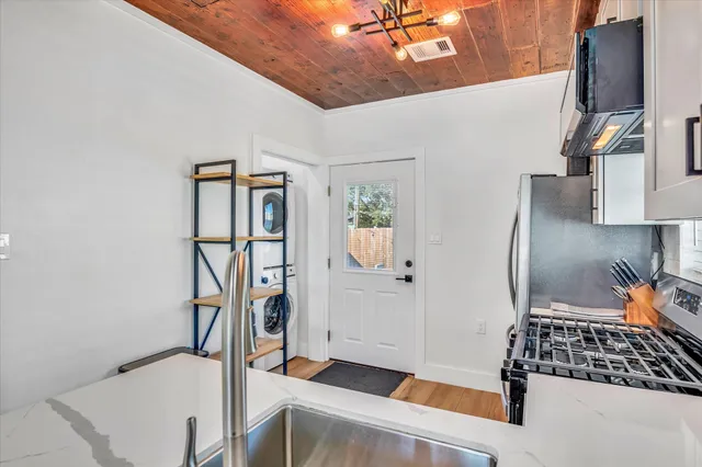 a view of living room with washer and dryer