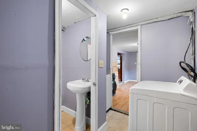 a bathroom with a sink and toilet