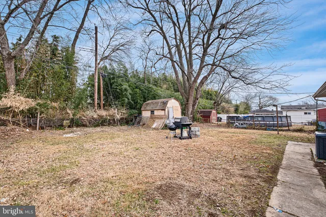 a view of a outdoor space with swimming pool