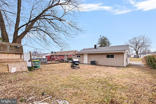 a view of a house with a snow in the yard