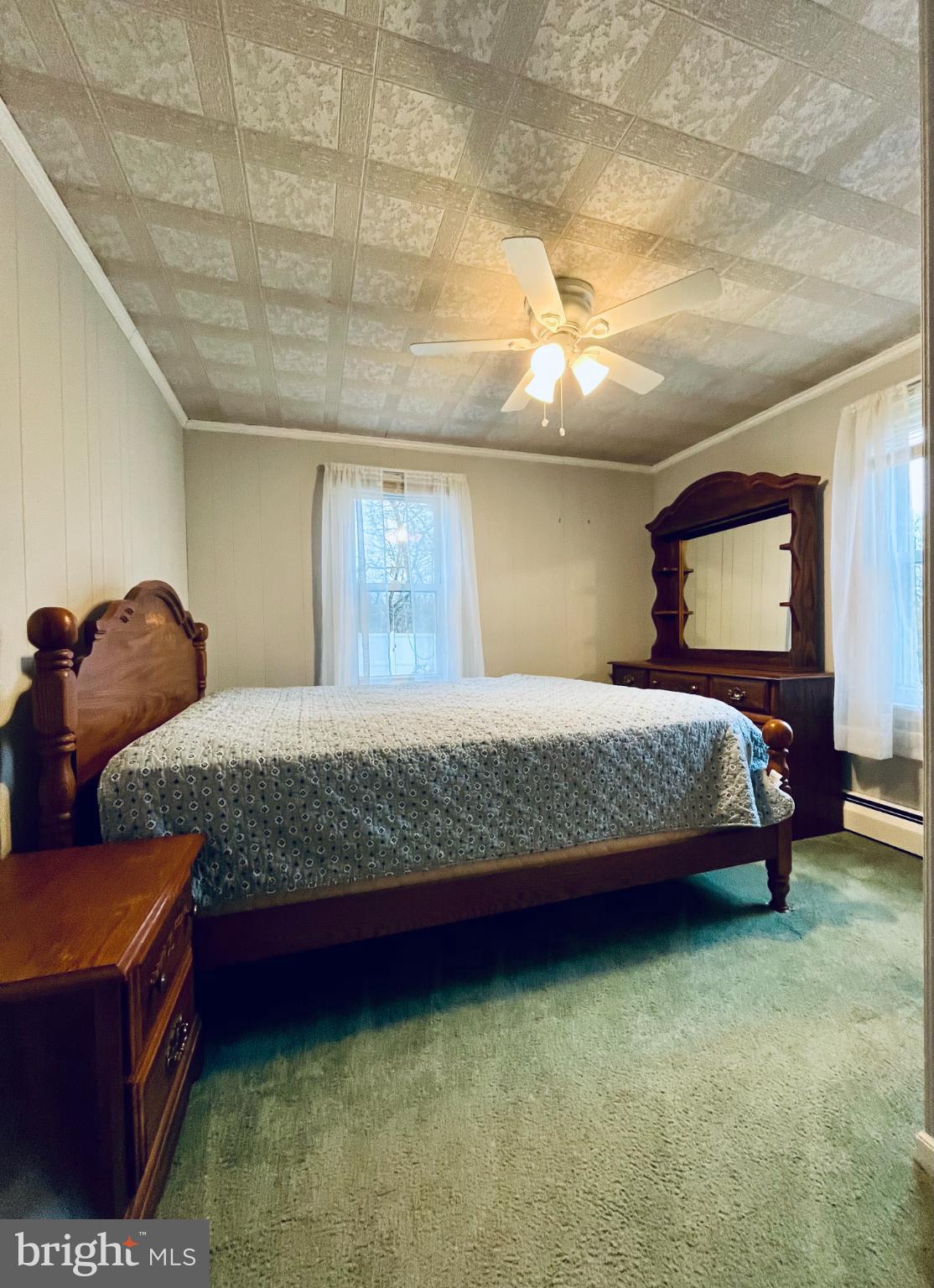 2510 Whiteford Road Whiteford, MD 21160 - Photo 17 of 22 a bedroom with a bed and dresser